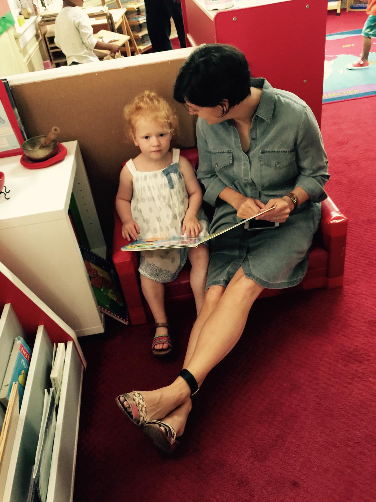 Woman teach a kid how to read
